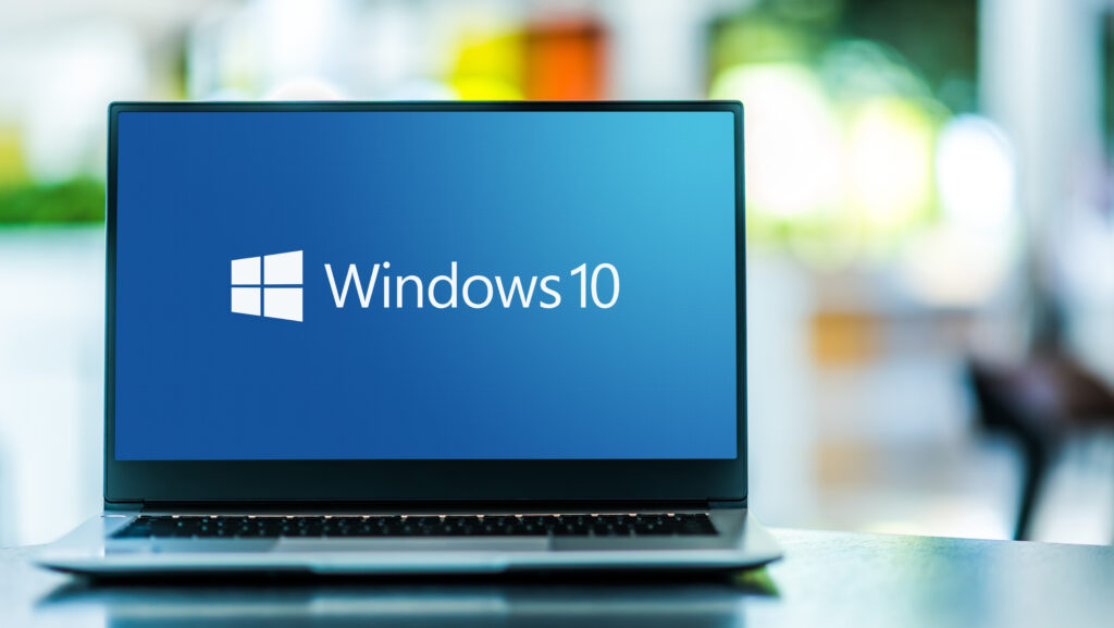 Laptop displaying the Windows 10 logo.