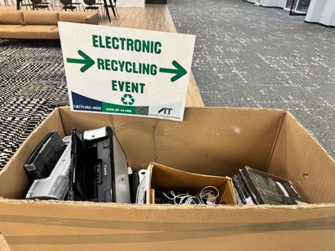 Collected electronics prepared by the AIT team for e-waste recycling during a tenant electronics collection event.
