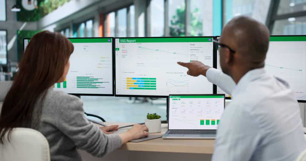 Team reviews ESG reporting dashboards.