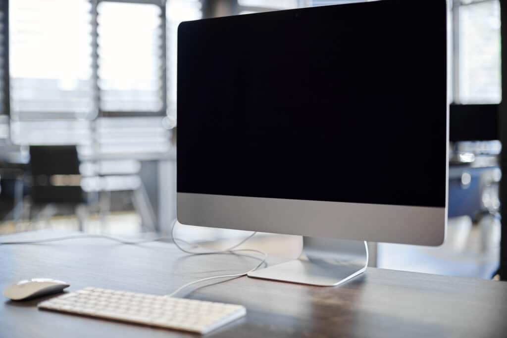 Retired desktop workstation in an office, representing IT asset disposition and value recovery in commercial electronics recycling