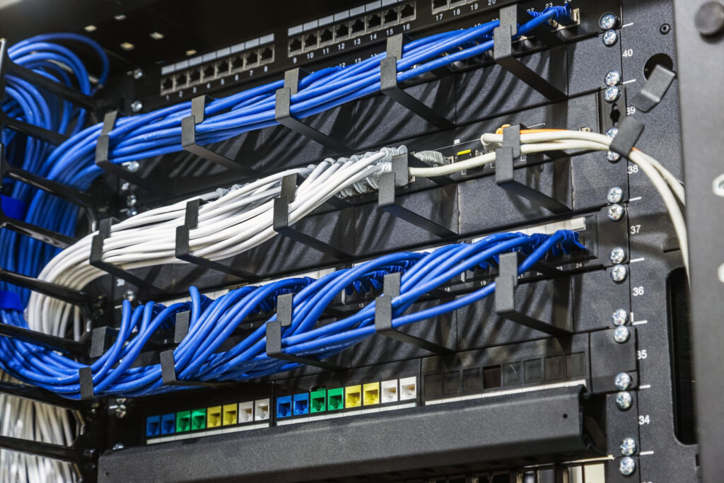 Close-up of patch panels with organized Ethernet cabling in a data center