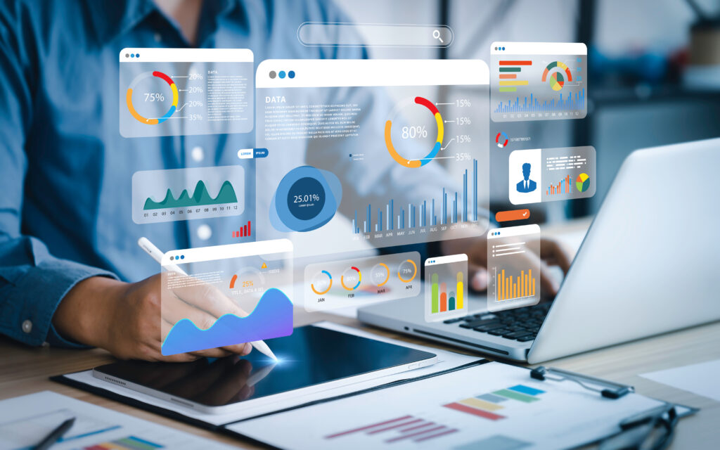 Professional using a tablet and laptop with a digital analytics dashboard overlay, posing the question: what is a SOC 3 report? Which includes compliance monitoring, security metrics, and audit-ready documentation.